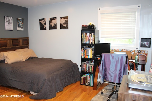 bedroom featuring hardwood / wood-style flooring