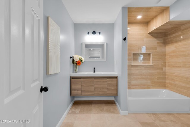 bathroom featuring tile patterned floors and vanity