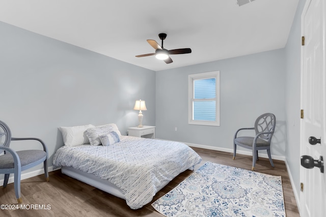 bedroom featuring ceiling fan and hardwood / wood-style flooring