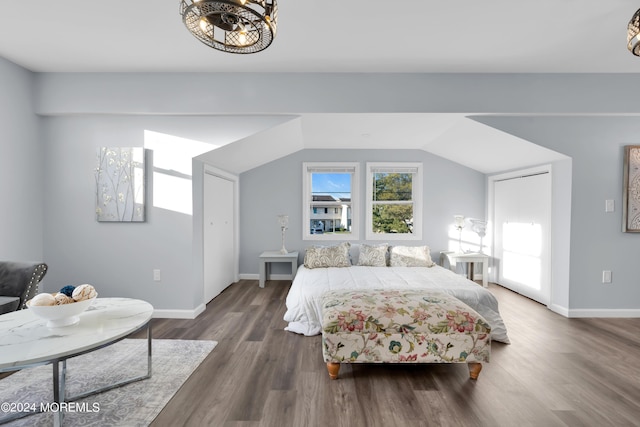 bedroom featuring dark wood-type flooring