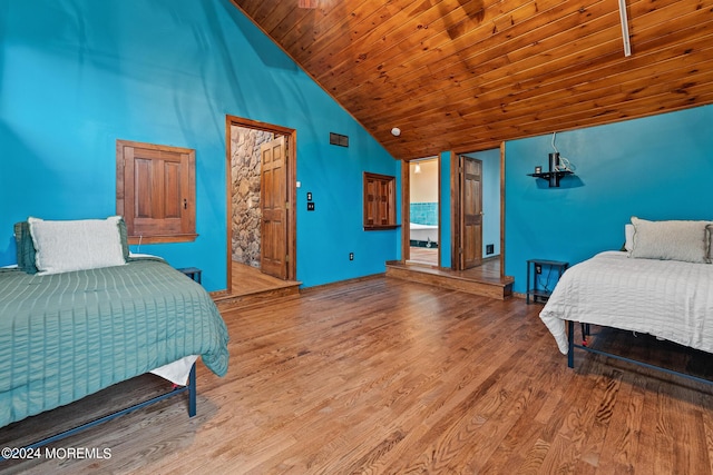 bedroom with wood-type flooring, wood ceiling, and vaulted ceiling