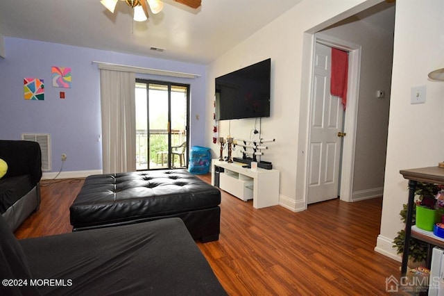 living room with ceiling fan and hardwood / wood-style floors