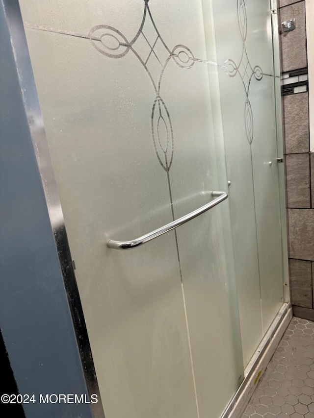 bathroom with tile patterned floors