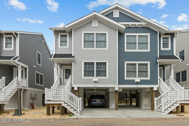 beach home with stairs and a carport