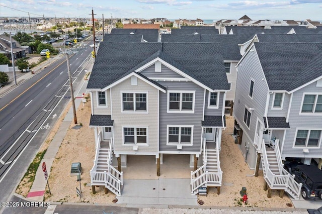 3 Cummins St, Mantoloking, NJ 08738 - view of front of home featuring stairs and roof with shingles