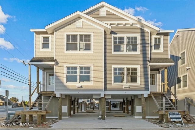 view of front of home with a carport