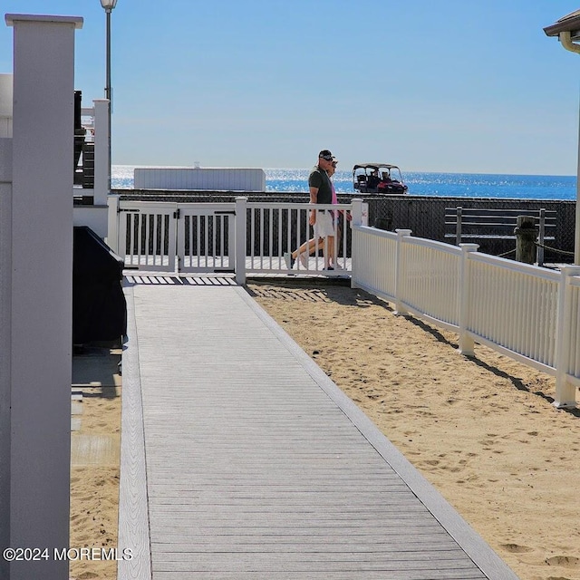 view of patio featuring a water view