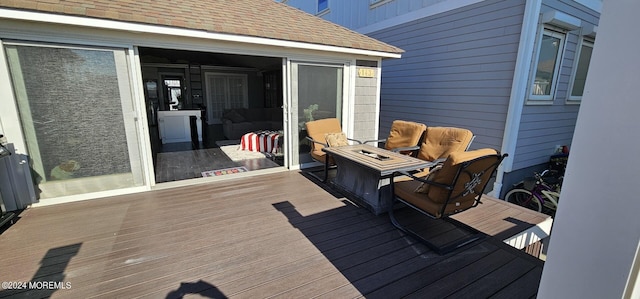 deck featuring a fire pit