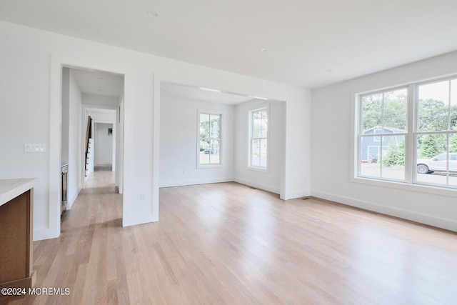 empty room with light wood-type flooring