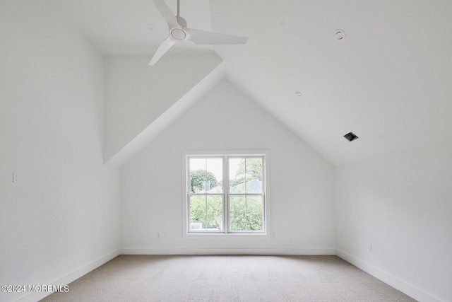 bonus room with ceiling fan, carpet flooring, and lofted ceiling