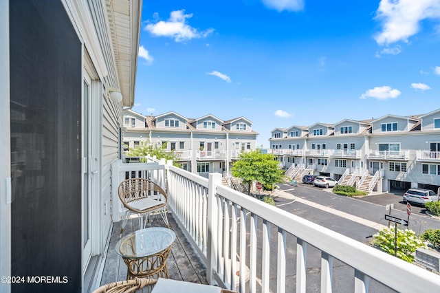 balcony featuring a residential view