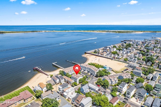 aerial view with a residential view and a water view