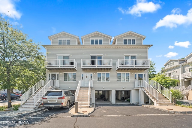 view of front of property with a balcony