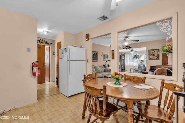 dining space with ceiling fan