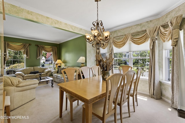 dining room with a notable chandelier, light colored carpet, and crown molding