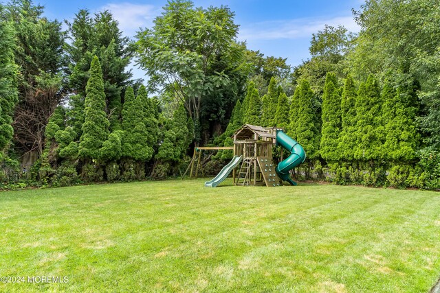 view of yard featuring a playground