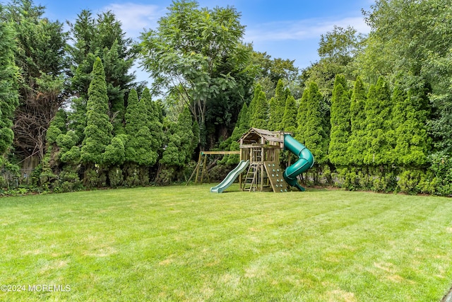 view of yard with a playground