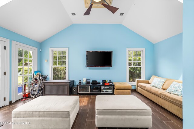 living room with high vaulted ceiling, a wealth of natural light, ceiling fan, and dark hardwood / wood-style floors