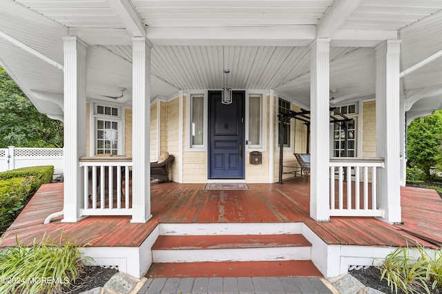 property entrance featuring covered porch