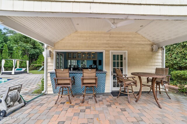 view of patio with ceiling fan