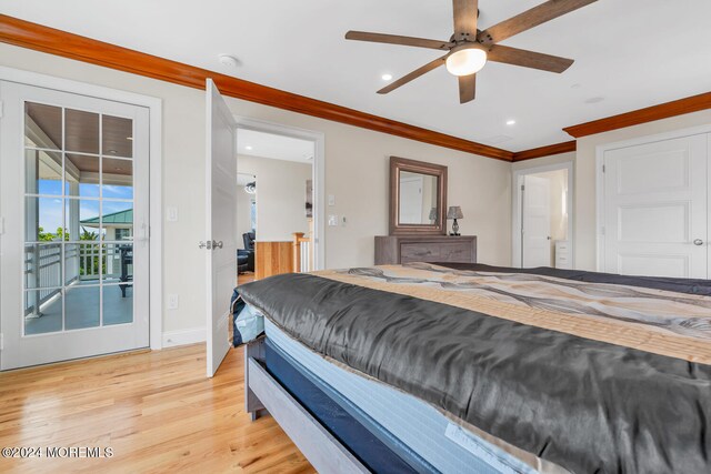 bedroom with ceiling fan, access to outside, light hardwood / wood-style flooring, and ornamental molding