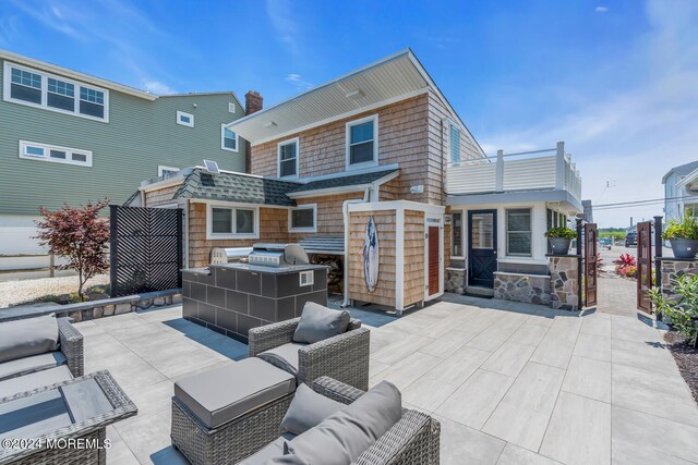 view of patio with outdoor lounge area