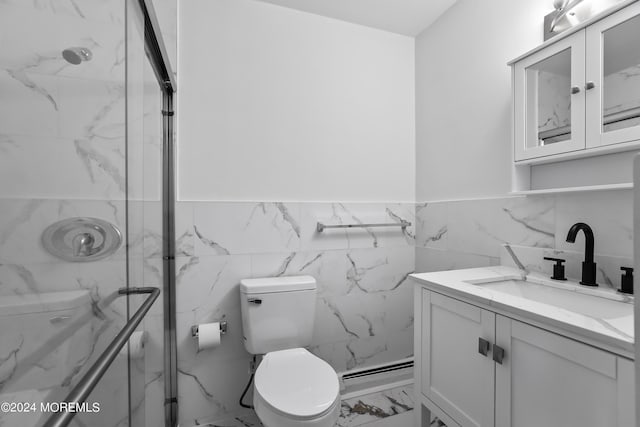 bathroom featuring toilet, vanity, and a baseboard heating unit