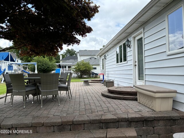 view of patio with a playground