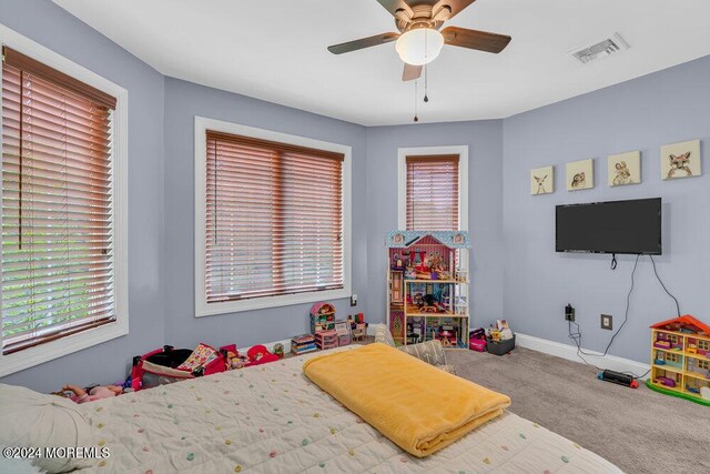 bedroom with carpet flooring and ceiling fan