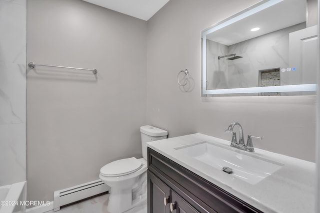 bathroom featuring vanity, baseboard heating, and toilet