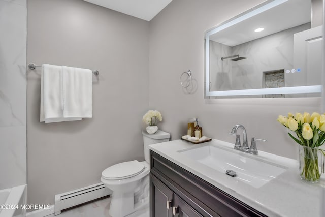 bathroom featuring vanity, toilet, and baseboard heating