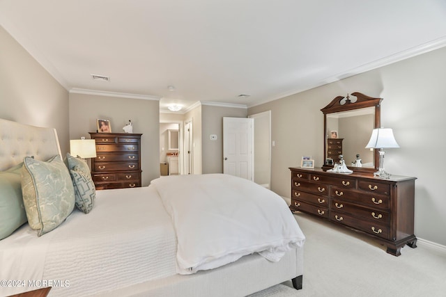 bedroom with carpet floors, visible vents, and ornamental molding