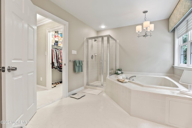 full bath with baseboards, a shower stall, a bath, and a walk in closet