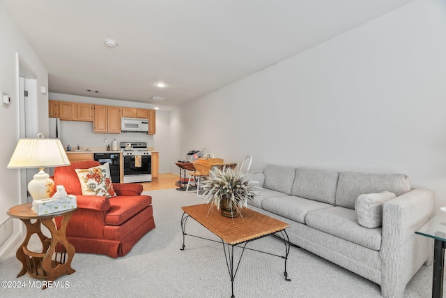 living area featuring recessed lighting