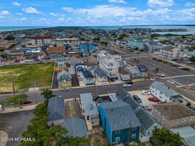 aerial view with a water view and a residential view