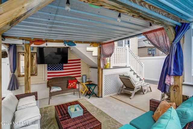 view of patio / terrace with fence and an outdoor hangout area