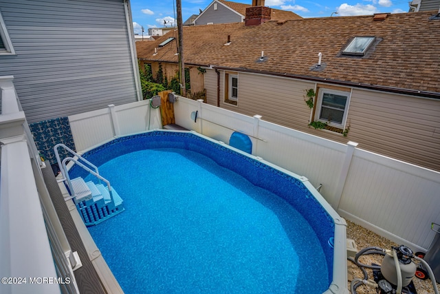 view of pool featuring a fenced in pool and a fenced backyard