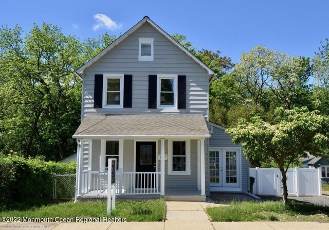 view of property with covered porch