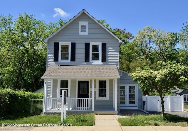 front of property with covered porch and french doors