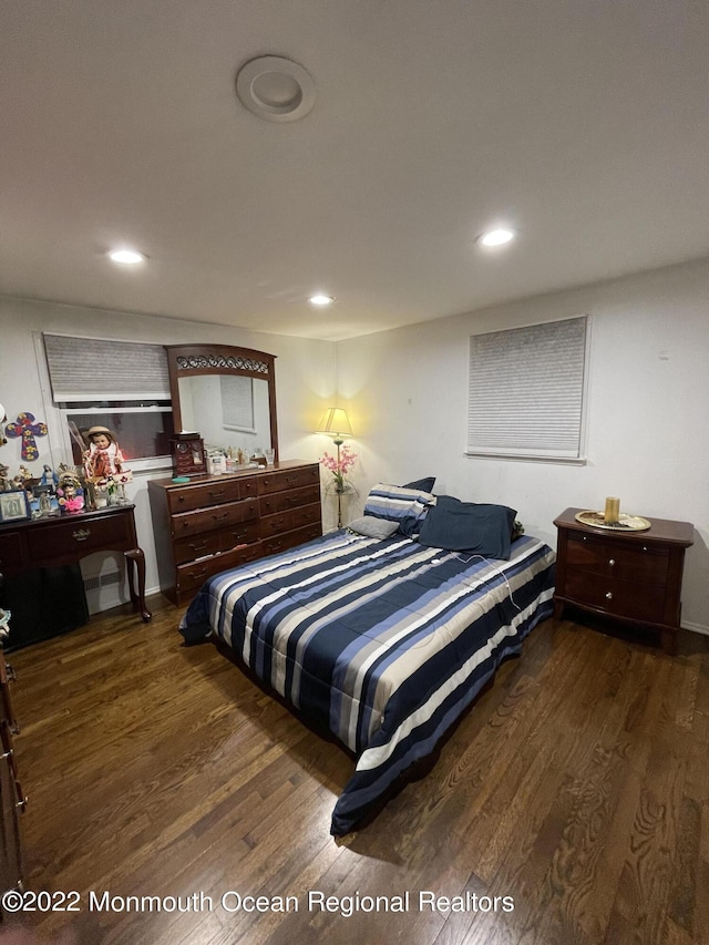 bedroom featuring dark hardwood / wood-style floors