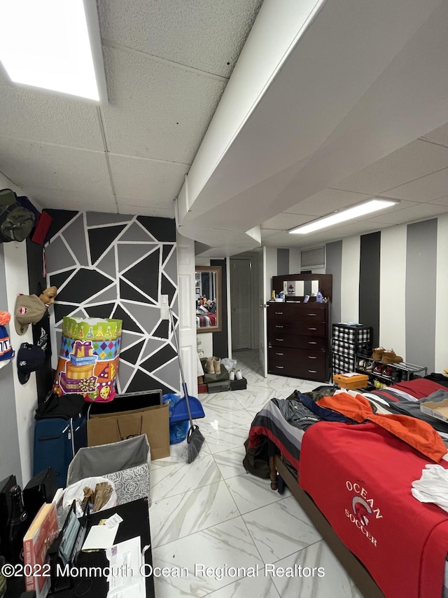 bedroom featuring a drop ceiling