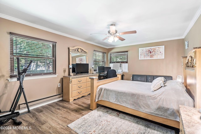 bedroom featuring baseboard heating, ceiling fan, crown molding, and wood-type flooring