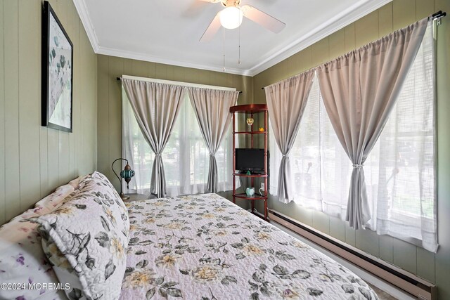 bedroom featuring ceiling fan and crown molding