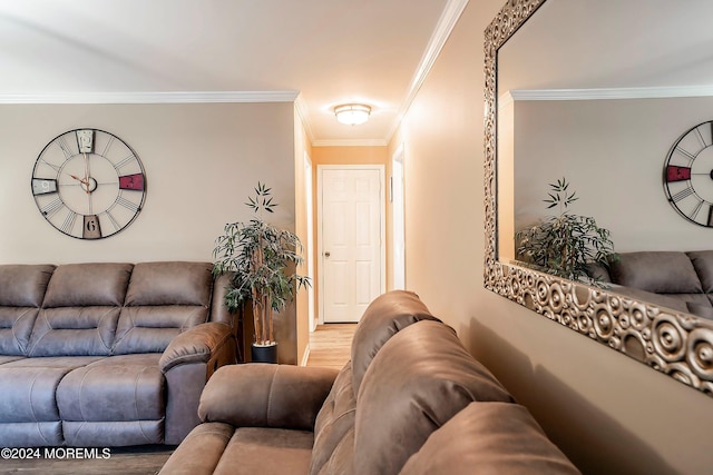 living room with crown molding and wood-type flooring