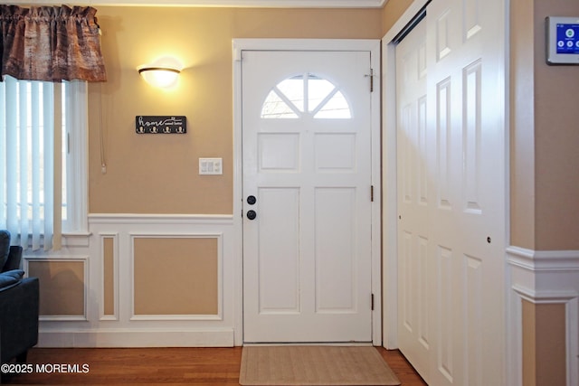 foyer entrance with wood-type flooring