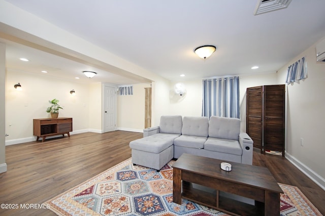 living room with dark hardwood / wood-style floors