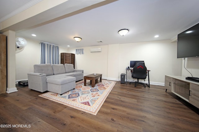 living room featuring a wall unit AC, ornamental molding, and dark hardwood / wood-style flooring