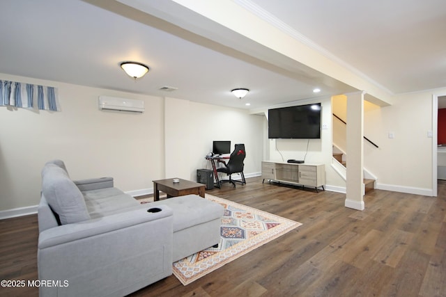 living room with dark wood-type flooring and a wall mounted air conditioner