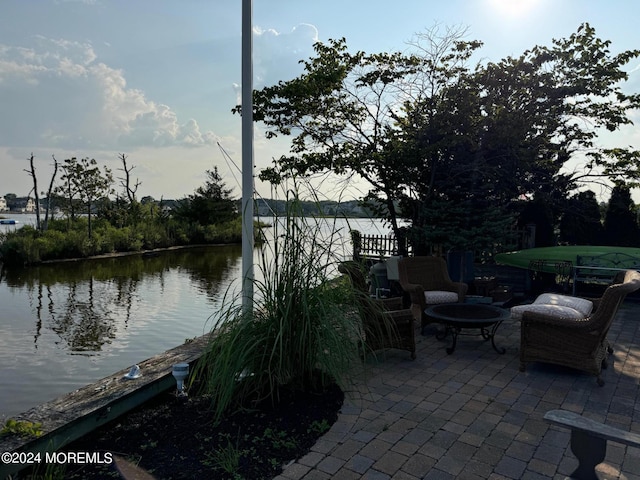 view of patio / terrace with a water view