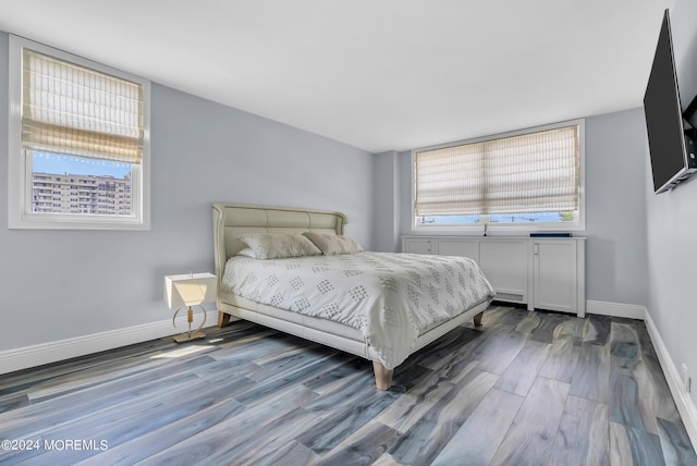 bedroom featuring hardwood / wood-style flooring